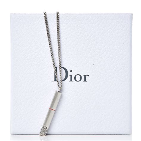 dior cigarette necklace|dior letters necklace value.